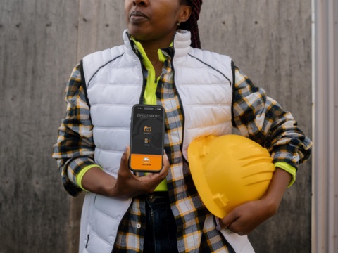 Direct Shot on iPhone, held by a construction worker